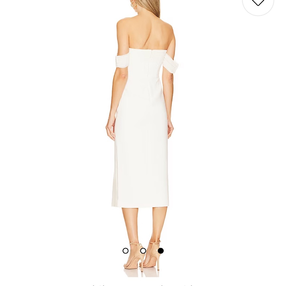 Revolve dress size 2 didn’t fit. Never worn! Tags still on.